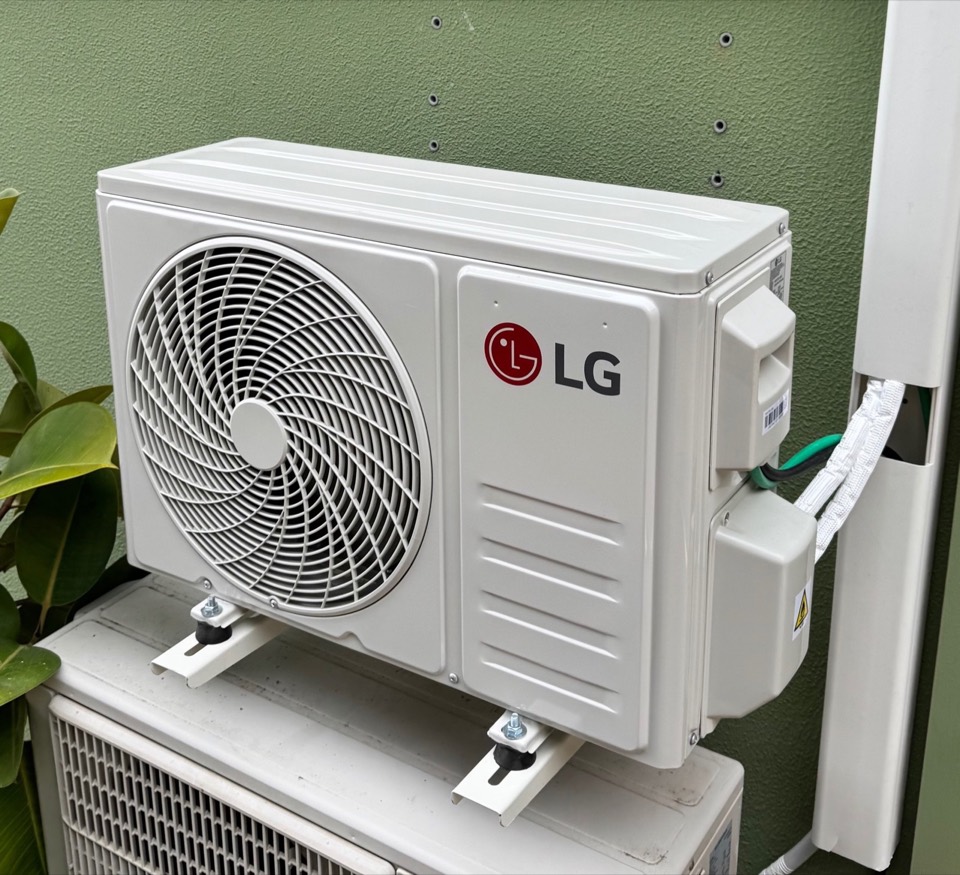 LG outdoor unit on wall brackets