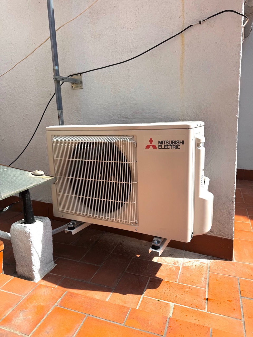Mitsubishi Electric outdoor unit on a terrace