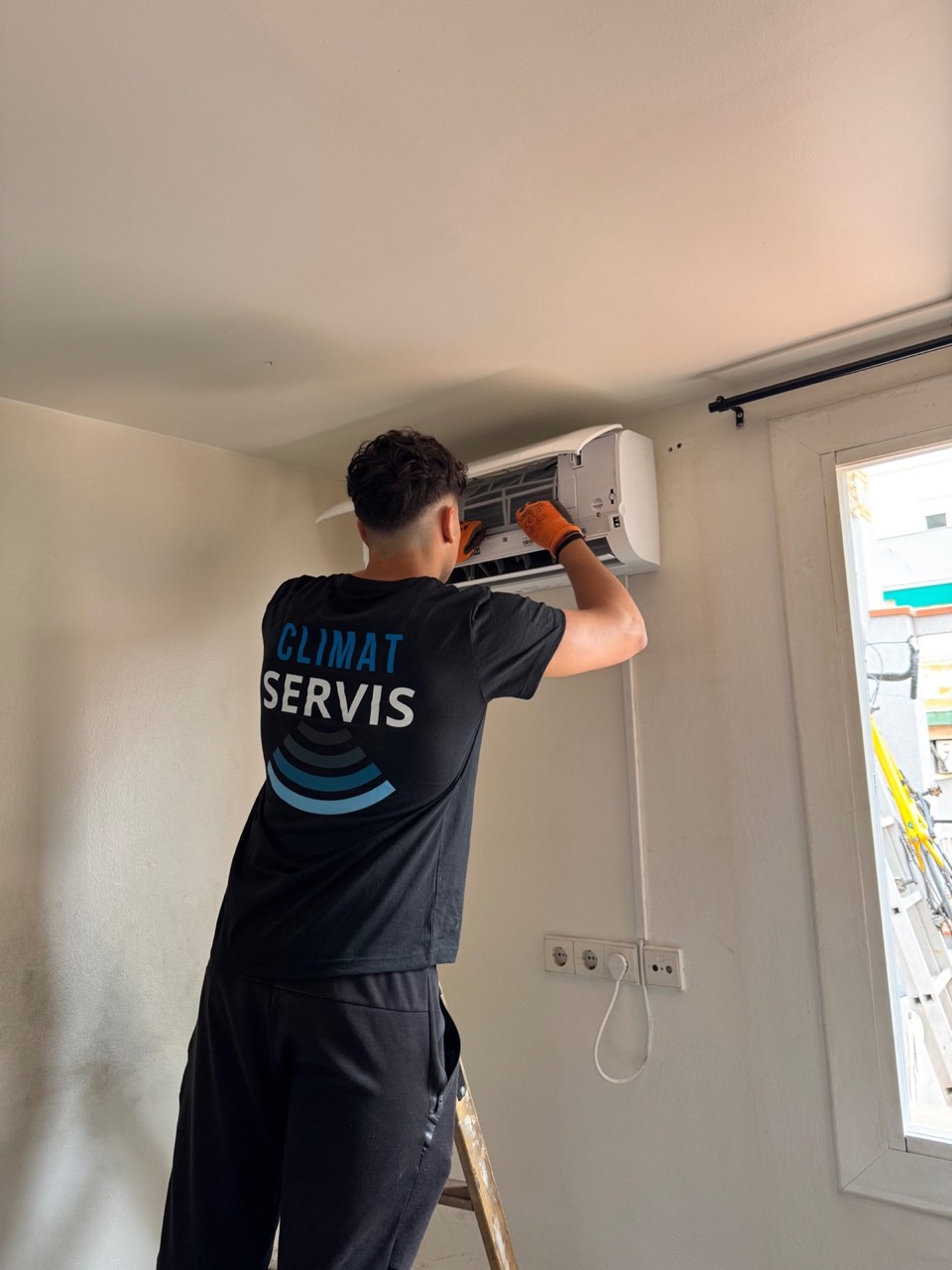 Our technician working on an indoor unit